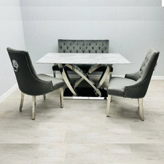 Side view of California Grey Marble dining set by Solid Furniture UK with velvet dining chairs and chrome base table