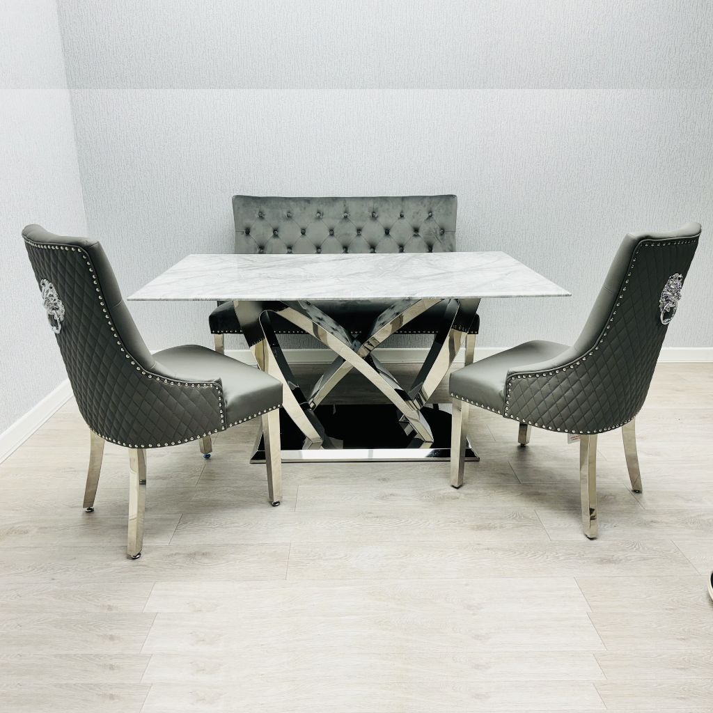 Front view of California Grey Marble Dining Table with chairs arranged around it in a stylish modern dining room setup solid furniture UK