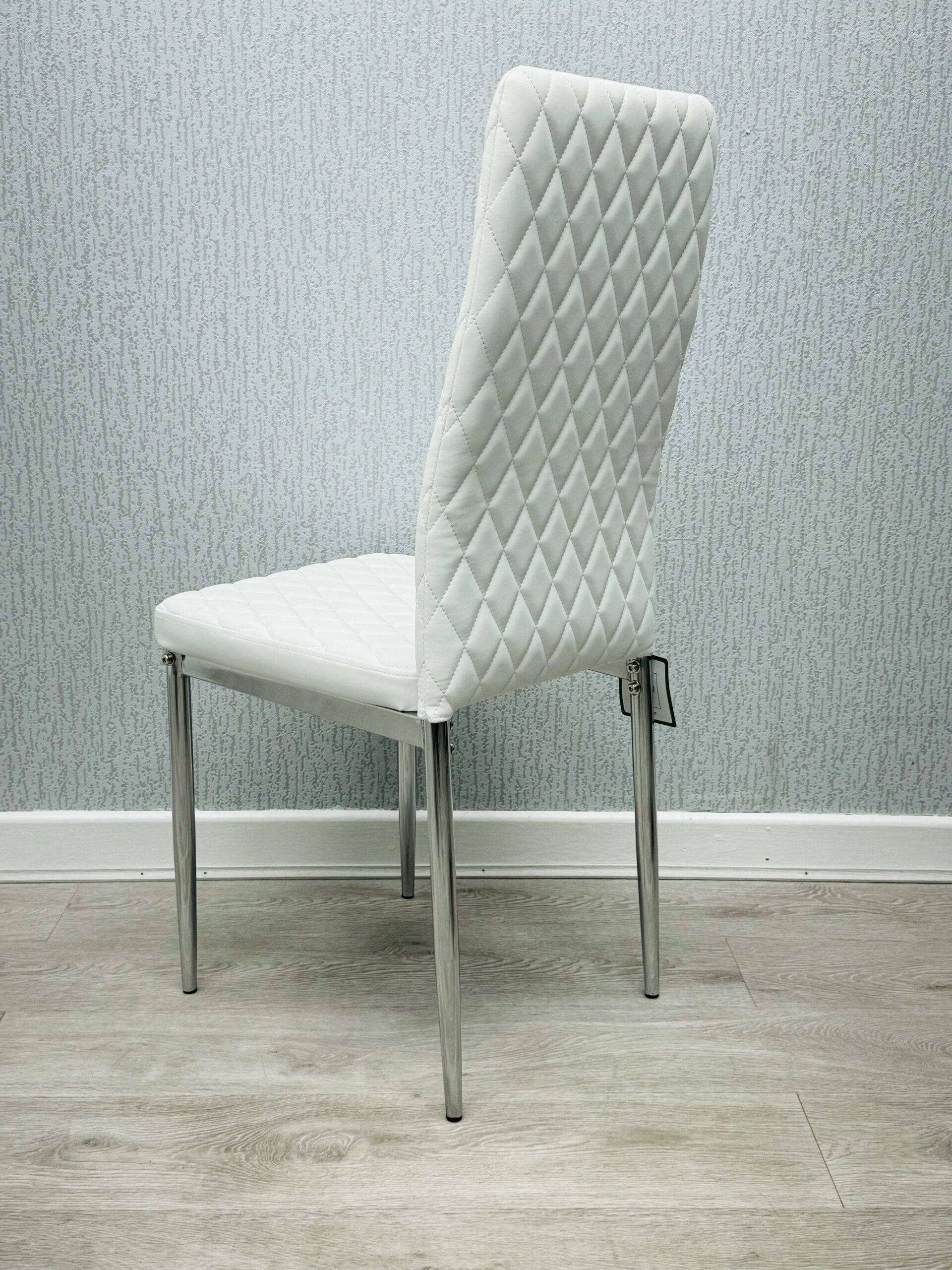 Back view of white California PU Dining Chair showing modern design and chrome legs by Solid Furniture UK