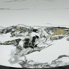 Close-up detail of Capri grey and white marble effect dining table surface showing luxury marble finish texture and design quality solid furniture UK