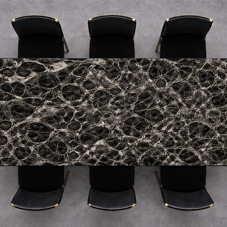 Black marble Chelsea dining table with chrome frame from Solid Furniture UK