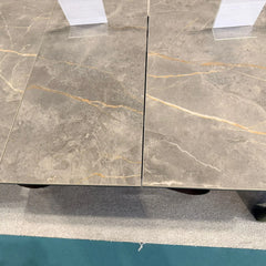 Close-up view of Cheshire dining table showing the Armani ceramic tabletop finish, Solid Furniture UK