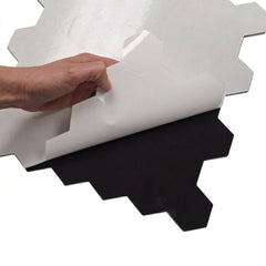 Peel-and-stick backing of chrome hexagon mosaic wall tiles 30 x 30cm pack of 10 by Solid Furniture LTD showing easy self-adhesive installation