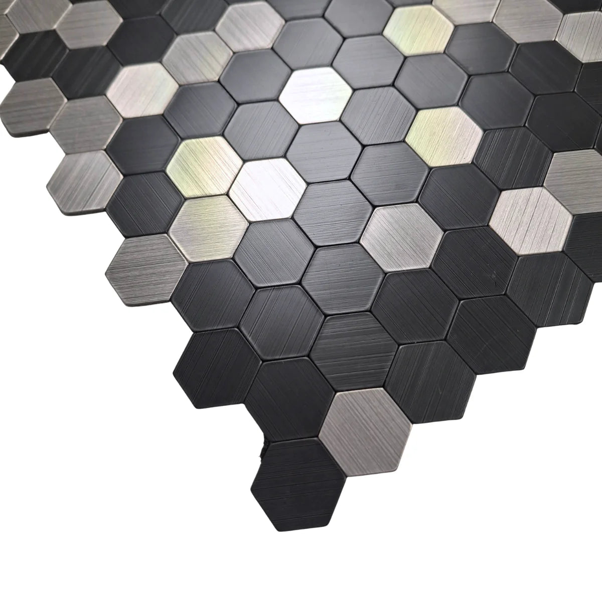 Close-up of chrome mini hexagon mosaic wall tiles 30 x 30cm pack of 10 by Solid Furniture LTD highlighting texture and shine