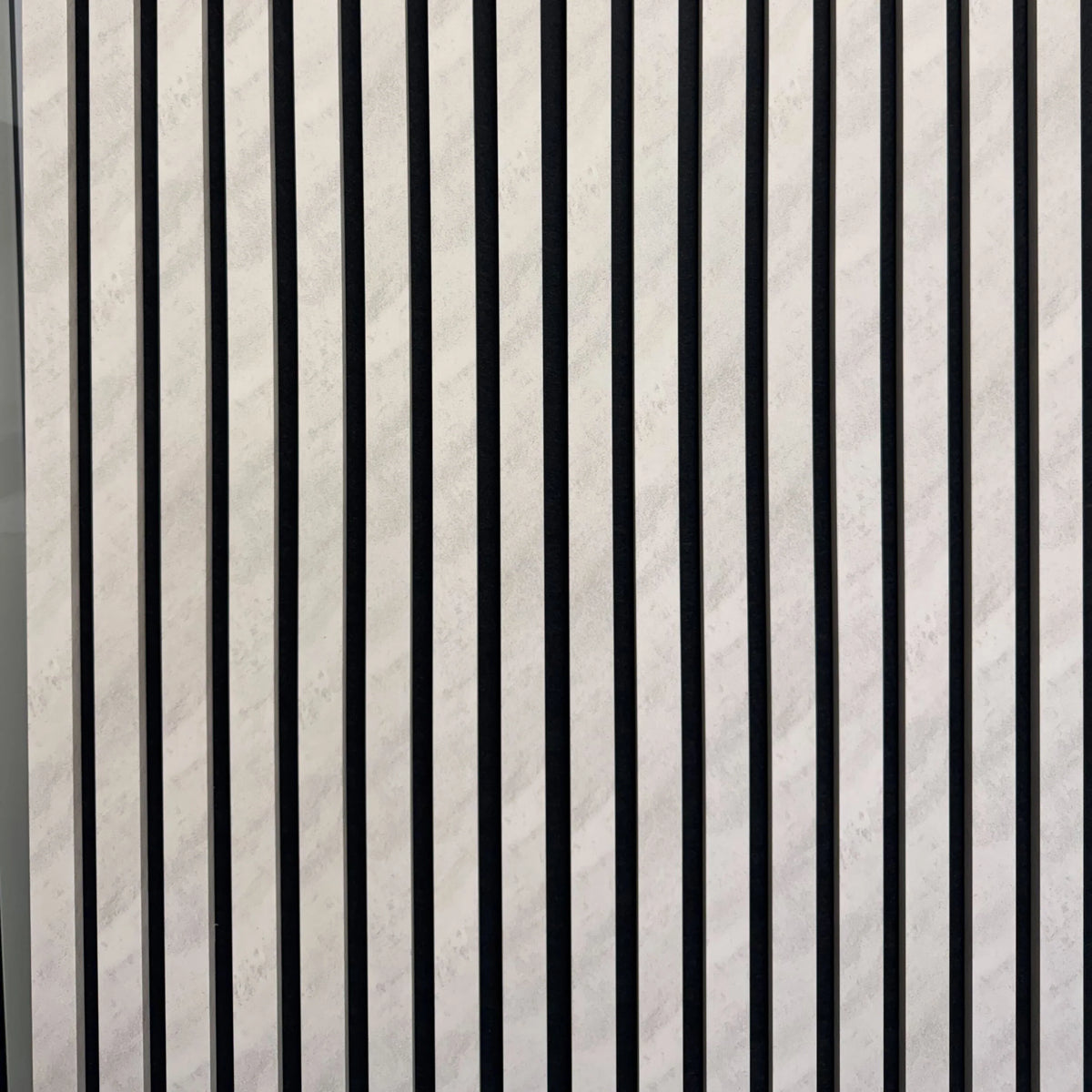 Front main view of concrete 3-sided acoustic slat wall panel 32 x 240 cm showing sleek vertical slats and industrial modern design solid furniture UK