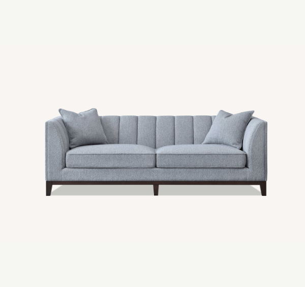 Front-side view of Cooper 3 seater sofa in dolphin grey bouclé fabric with deep cushions solid furniture UK