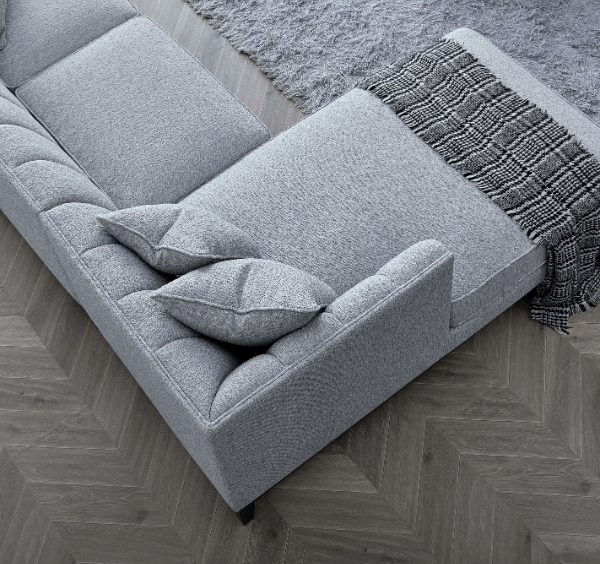 Angled view of Cooper left-hand dolphin bouclé corner sofa solid furniture UK