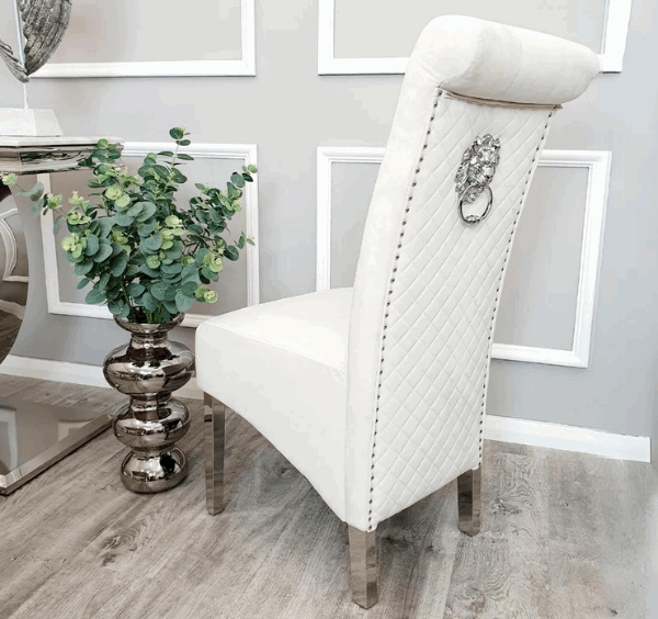 Cream Emma velvet dining chair UK side view showing soft velvet upholstery, curved backrest, and chrome legs from Solid Furniture UK.
