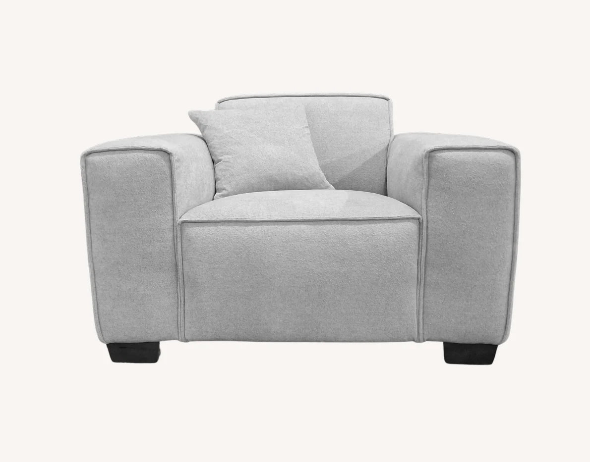 Dakota bouclé armchair with feather filled cushions and modern luxury design