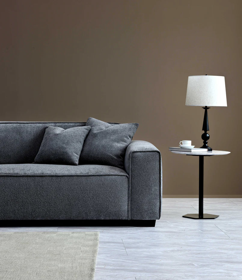 Corner view of Dakota luxury bouclé 4 seater sofa with chaise and soft textured fabric upholstery