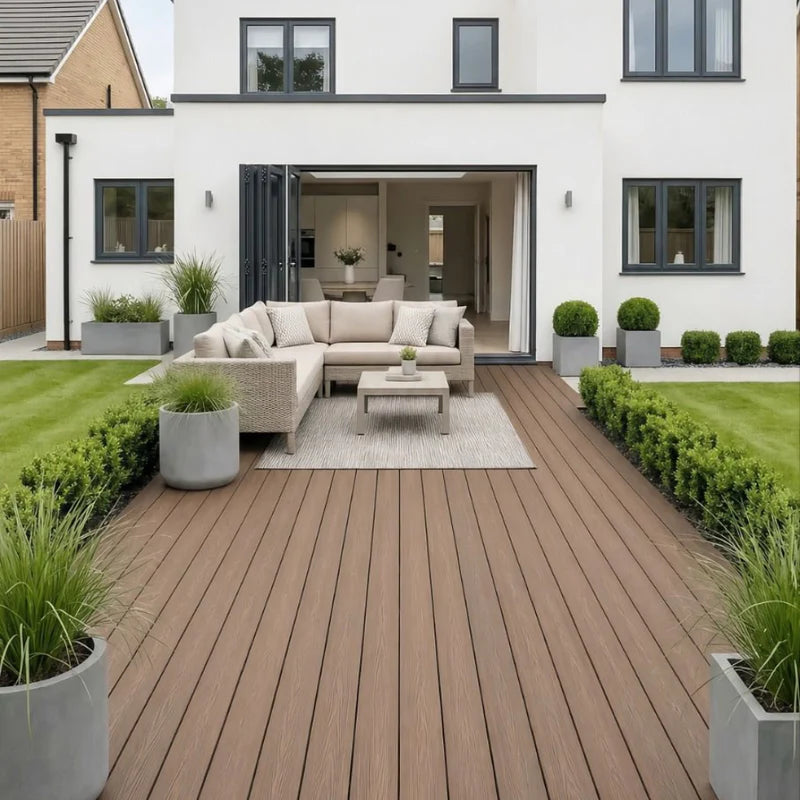 Dark brown 290cm composite decking installed at the front of a house by Solid Furniture UK