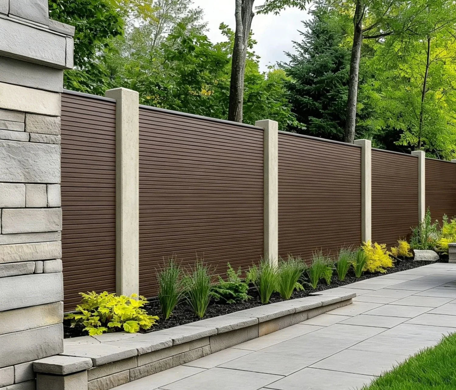 Dark Brown Composite Fence Panels by Solid Furniture UK installed to create a stylish outdoor boundary
