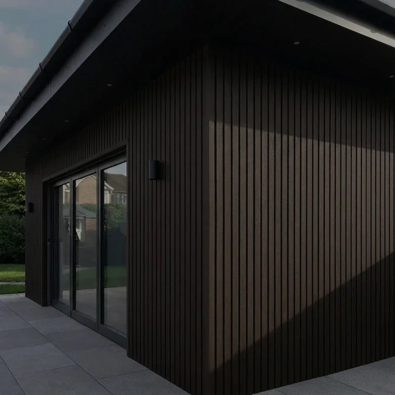 Dark brown 180cm wall panels installed on an exterior surface, featuring modern composite cladding that delivers a warm, natural wood-like finish for outdoor walls. solid furniture UK