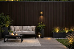 Dark brown WPC outdoor wall panels 180cm and 290cm installed on exterior wall in the UK by Solid Furniture LTD, ideal for gardens, patios, balconies, and feature walls