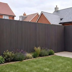 Dark grey seamless WPC boards installed on a contemporary outdoor patio wall – Solid Furniture UK