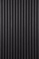 Close view of dark grey wall panels 60x240 by Solid Furniture UK highlighting matte finish, precise slatted design, and contemporary look