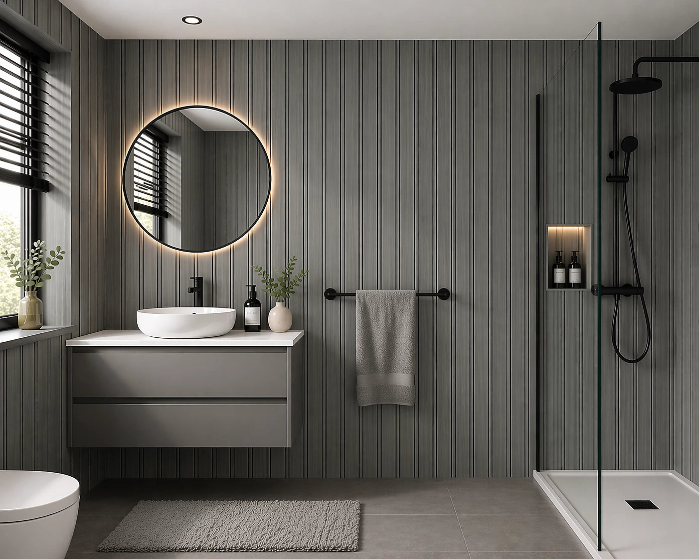 Dark Grey waterproof multi-width WPC wall panels installed in a modern bathroom by Solid Furniture UK