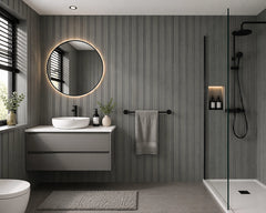 Dark Grey waterproof multi-width WPC wall panels installed in a modern bathroom by Solid Furniture UK