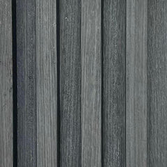 Close-up detail of dark grey WPC wall panel UK by Solid Furniture UK showing stone-effect texture and seamless waterproof surface finish for modern interiors.