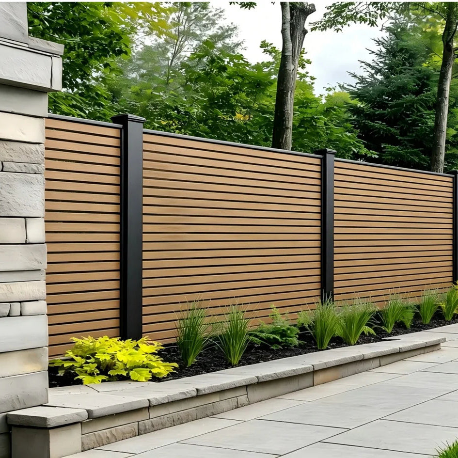 Solid Furniture UK composite fence panels installed around a modern patio area for stylish outdoor privacy and security