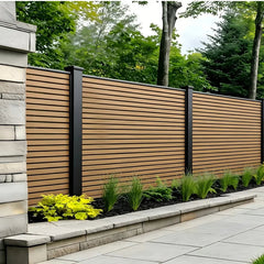 Solid Furniture UK composite fence panels installed around a modern patio area for stylish outdoor privacy and security