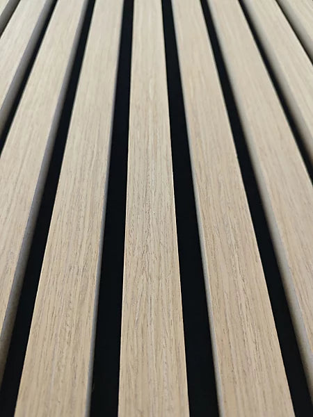 Angled view of dark oak HDF acoustic slatted wall panels 60x240cm by Solid Furniture UK in the UK highlighting depth, texture, and modern design.