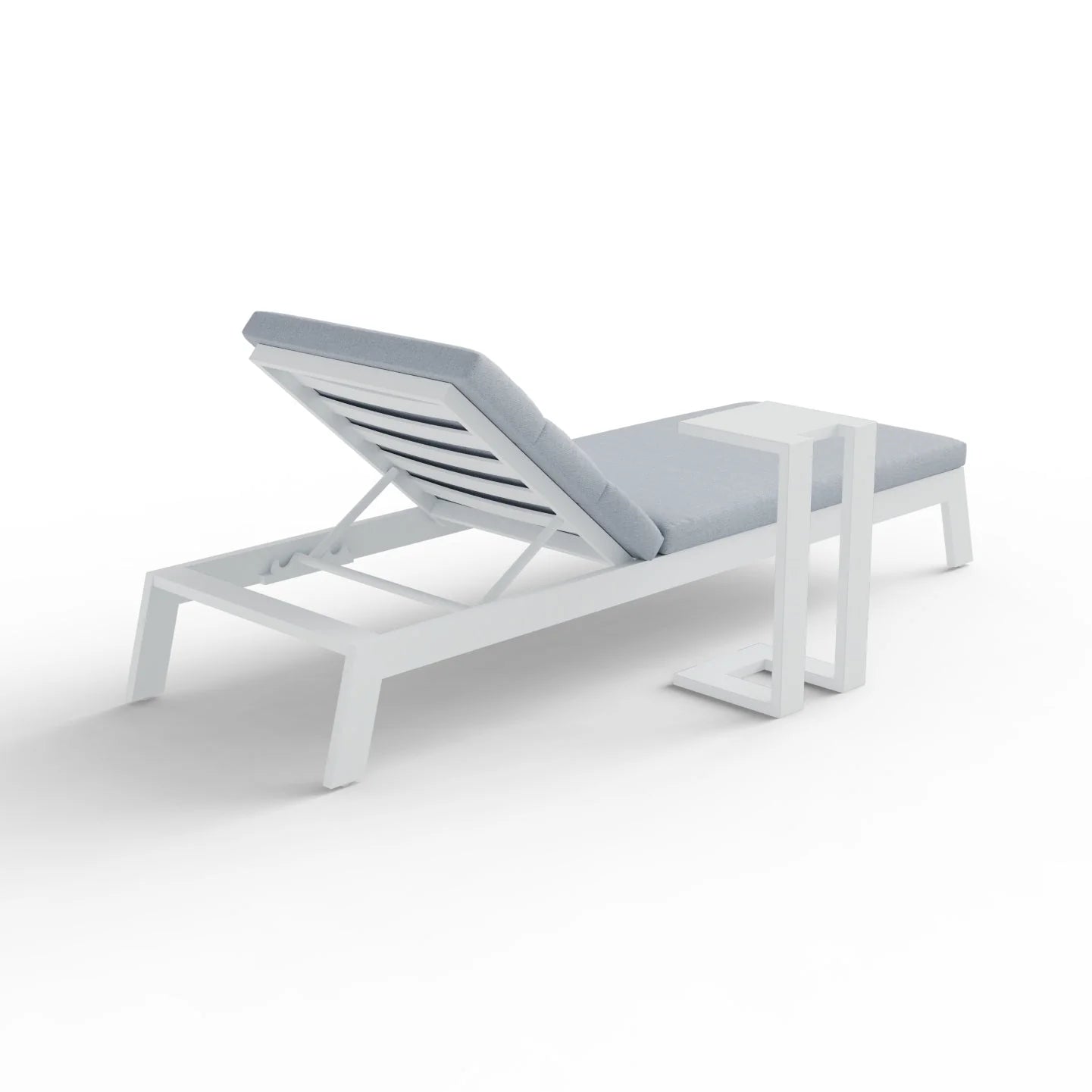 Angled view of Dasia sun lounger showing full structure and outdoor styling in UK garden from Solid Furniture UK