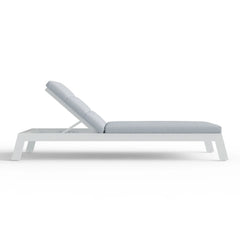 Side view of Dasia white sun lounger showing adjustable backrest and frame design from Solid Furniture UK
