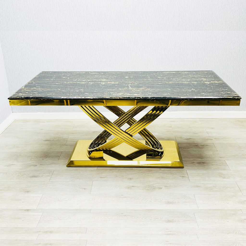 Elina gold marble dining table in black and gold finish shown in main front view with rectangular design and modern luxury style. solid furniture UK