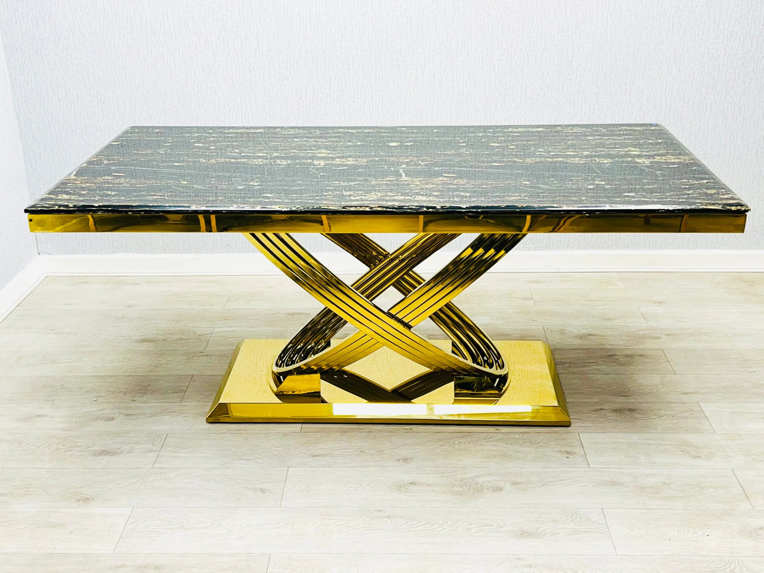 Top view of Elina black and gold marble dining table showing spacious rectangular surface and smooth marble-effect finish. solid furniture UK