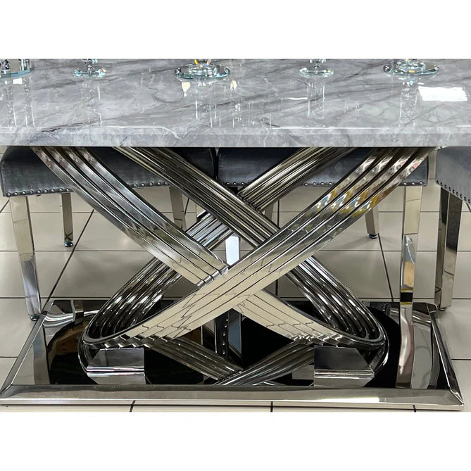 Close-up of polished chrome base of Elina marble dining table (160cm and 180cm sizes) showing modern metallic finish and support structure from Solid Furniture UK
