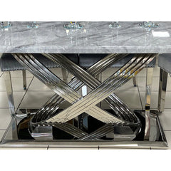 Close-up of polished chrome base of Elina marble dining table (160cm and 180cm sizes) showing modern metallic finish and support structure from Solid Furniture UK