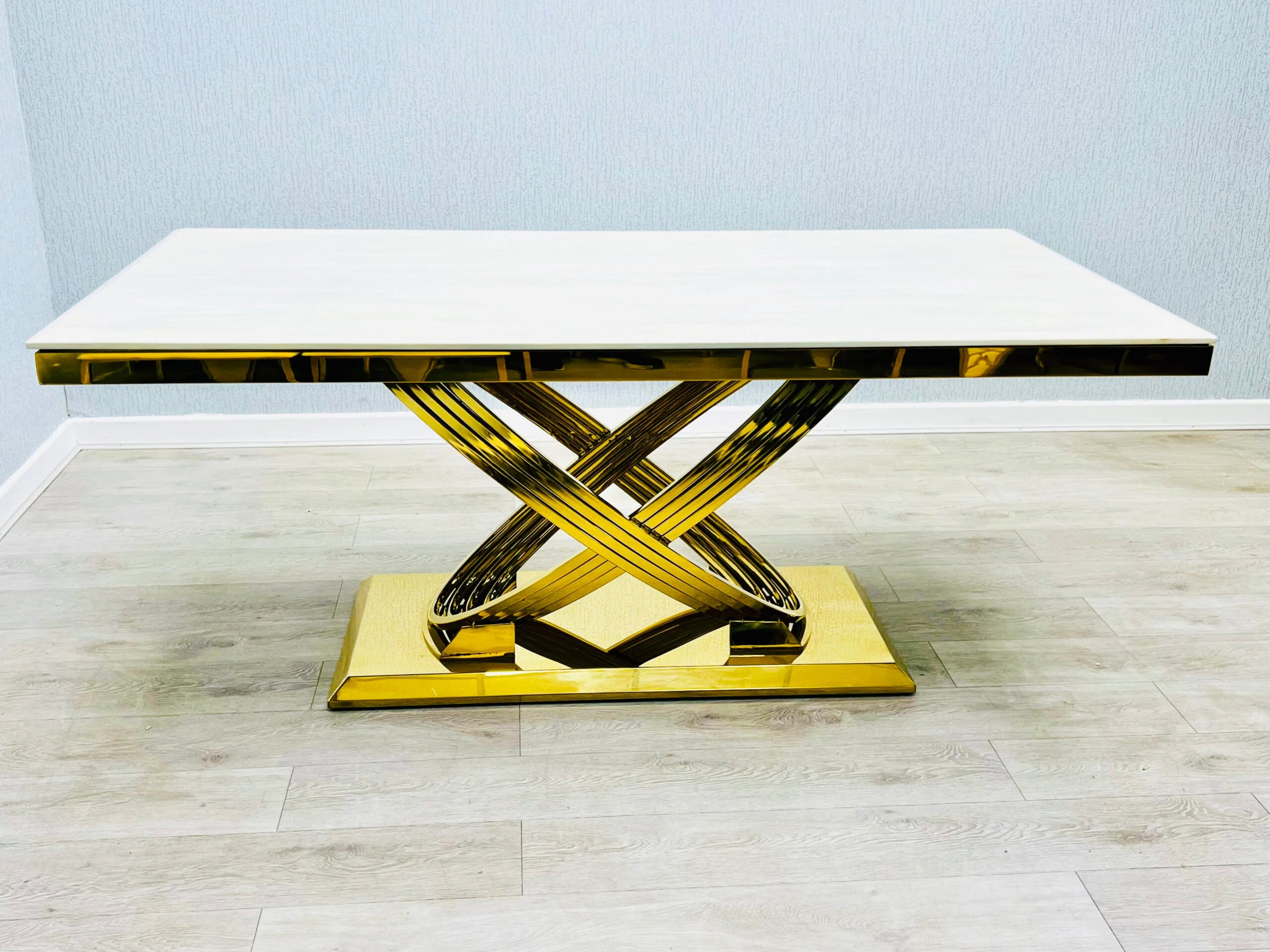 Elina gold marble dining table in white and gold finish shown in main view with elegant rectangular design and modern luxury style. solid furniture UK