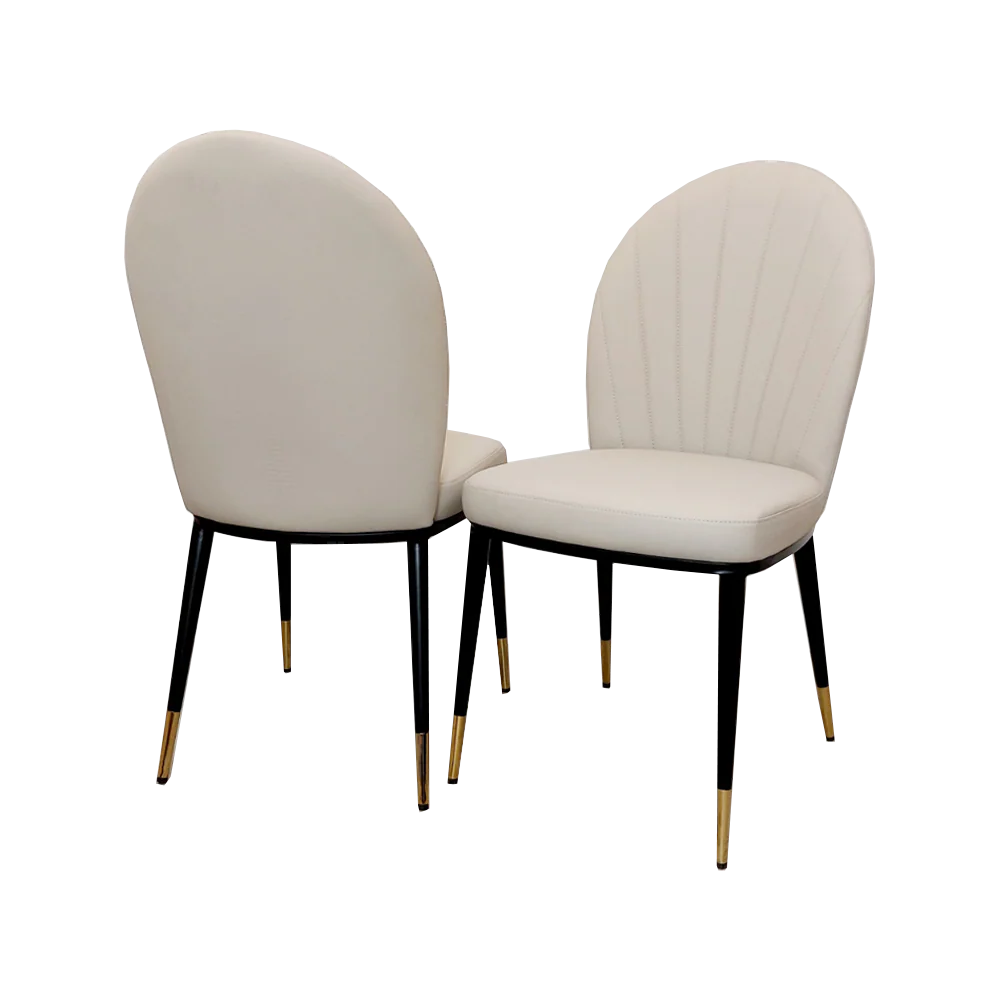 Pair of Etta beige leather dining chairs view at Solid Furniture UK