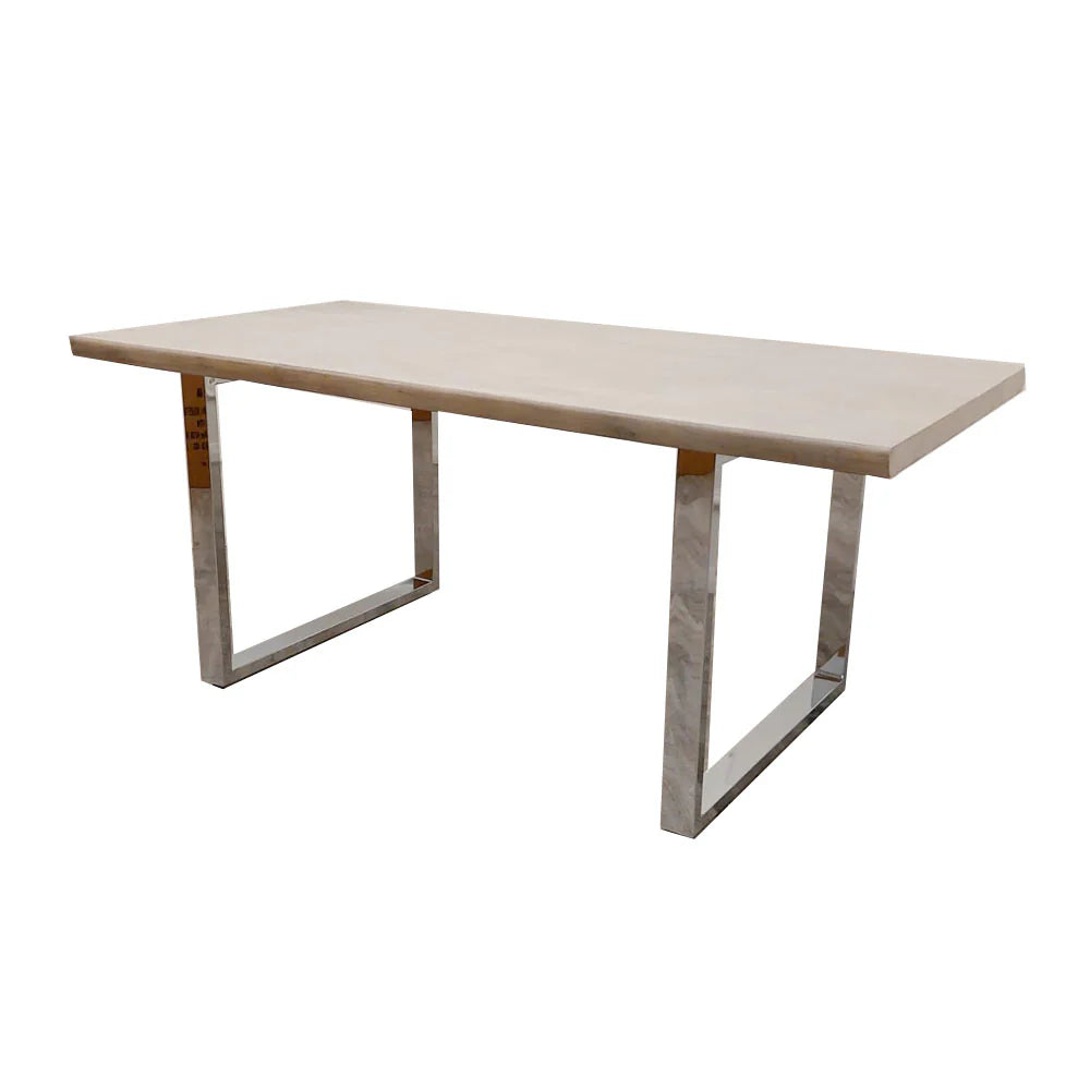 Angled view of Freya 1.8m dining table UK from Solid Furniture UK showing depth, natural pine wood texture, and sleek chrome metal legs