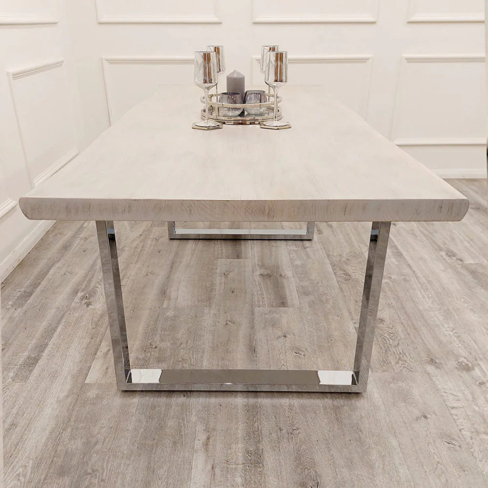 Front view of Freya 1.8m dining table UK from Solid Furniture UK showing wide solid pine wood surface and contemporary metal leg structure