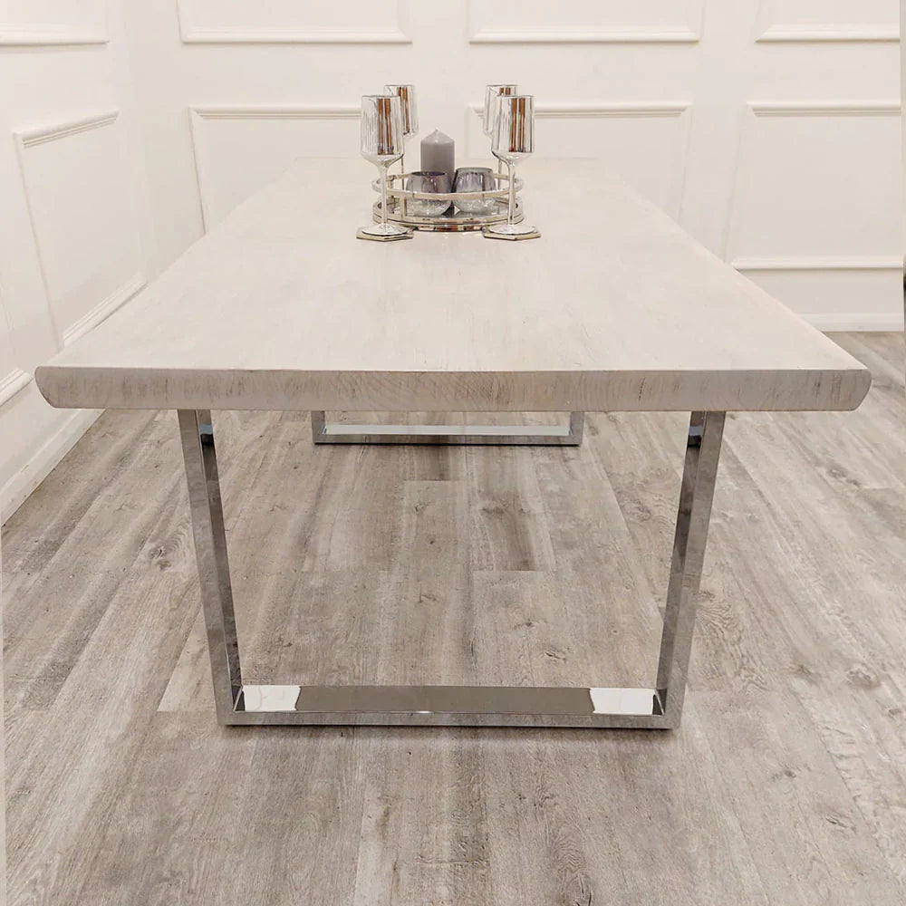 Freya pine wood dining table main view showcasing modern chrome legs Solid Furniture UK