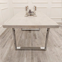 Freya pine wood dining table main view showcasing modern chrome legs Solid Furniture UK