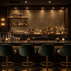 Close-up of gold square mosaic wall tiles 30 x 30cm pack of 10 by Solid Furniture LTD in a bar setting showing texture and polished shine