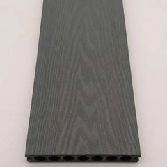 Grey 290cm composite decking boards installed in a modern outdoor space by Solid Furniture UK