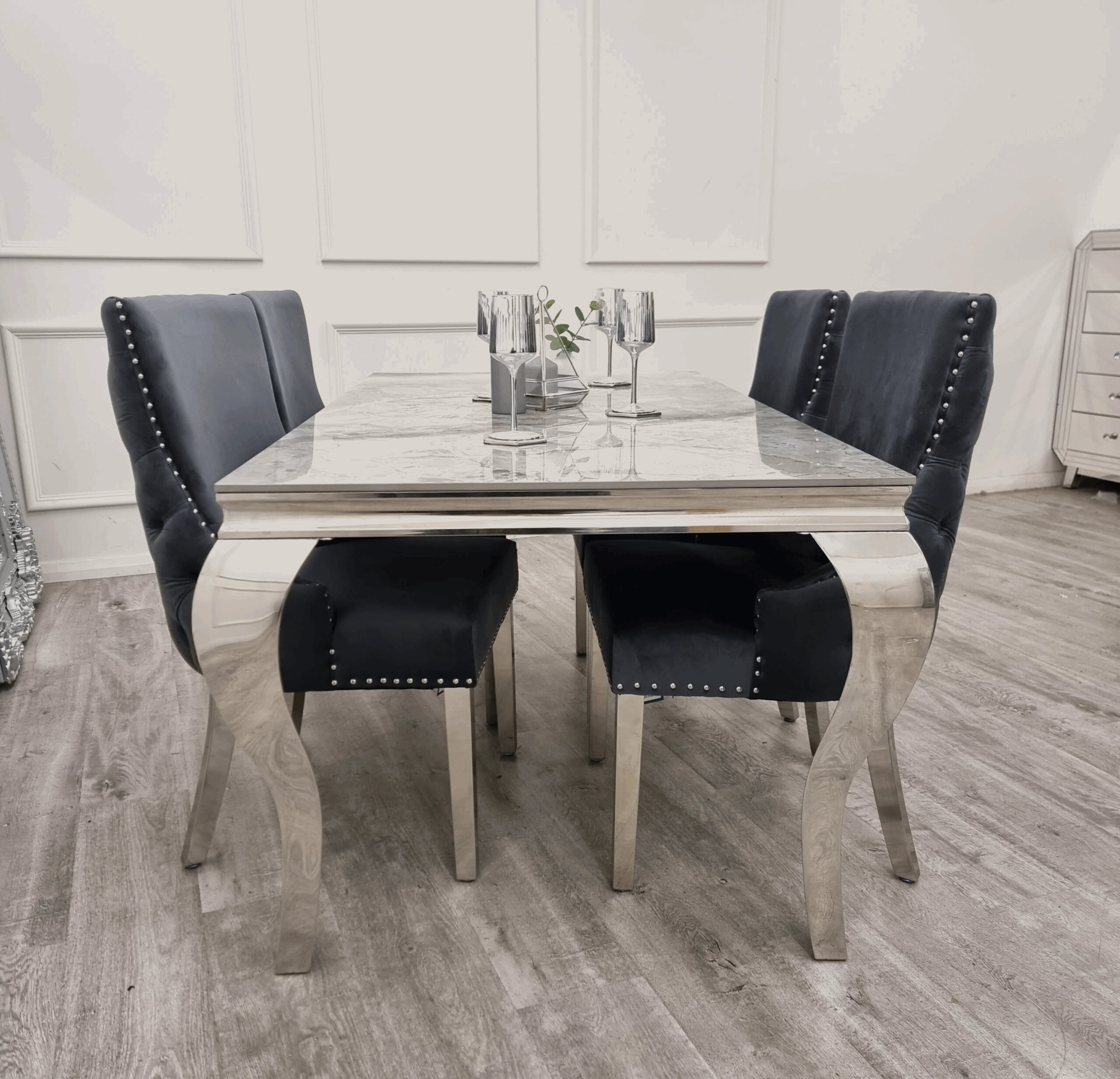Side view of Grey Louis marble effect dining table with chrome legs from Solid Furniture UK showing modern design and structure