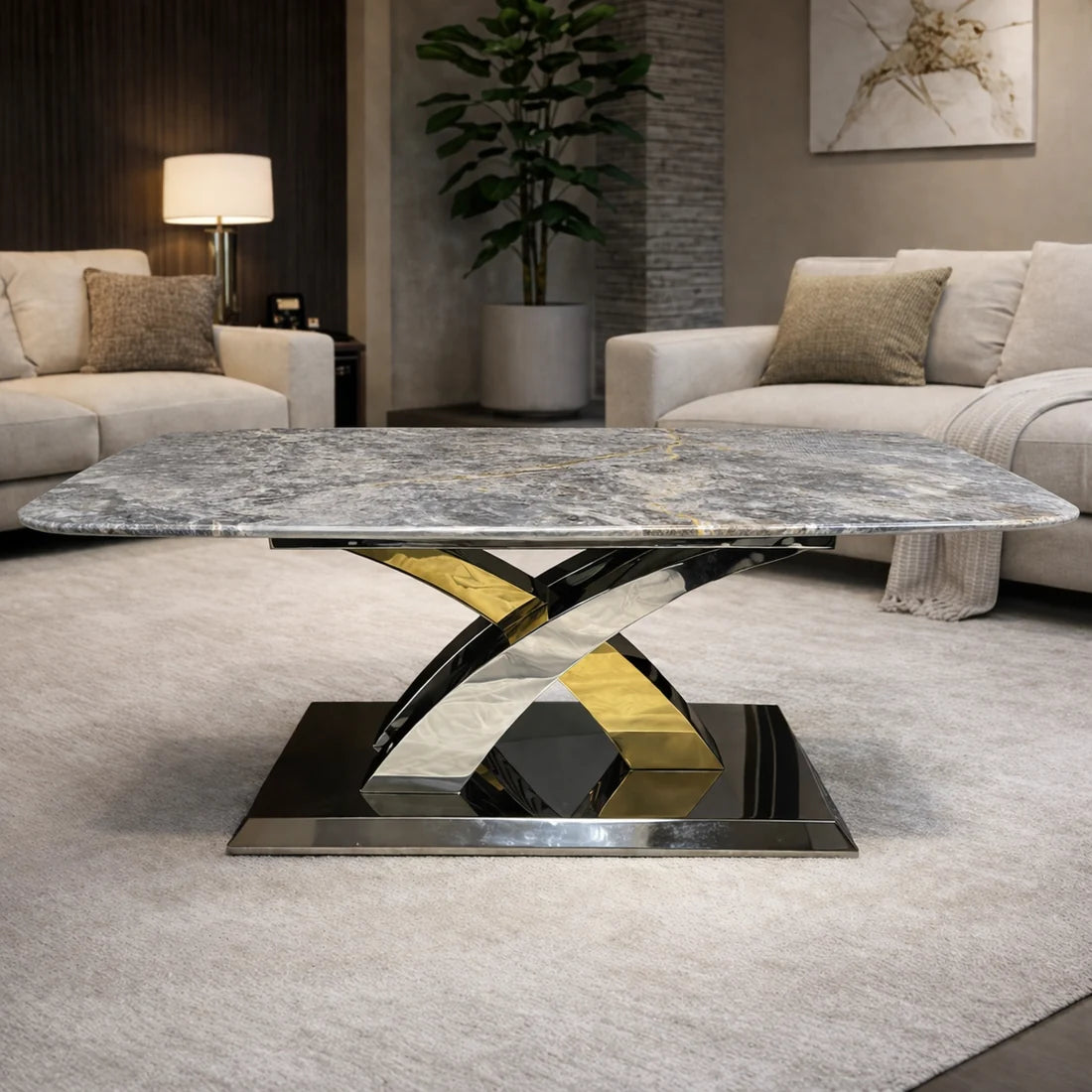 Grey marble coffee table styled in a modern living room, highlighting its refined surface and contemporary base by Solid Furniture UK