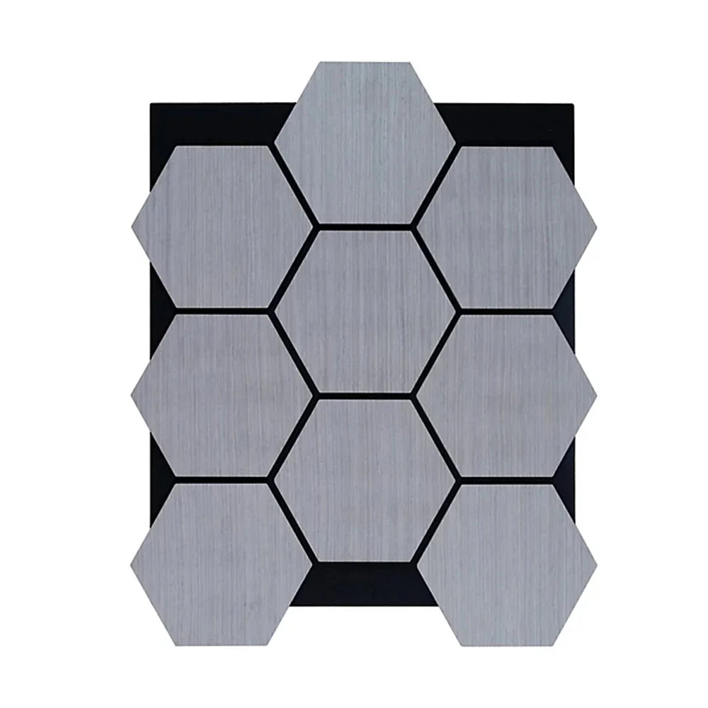Grey Oak Hexagon Acoustic Wall Panels installed in a modern living room. solid furniture UK