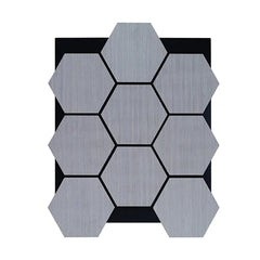 Grey Oak Hexagon Acoustic Wall Panels installed in a modern living room. solid furniture UK