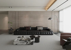 Grey seamless WPC wall panels with wood-effect finish installed on a modern interior wall Solid Furniture UK