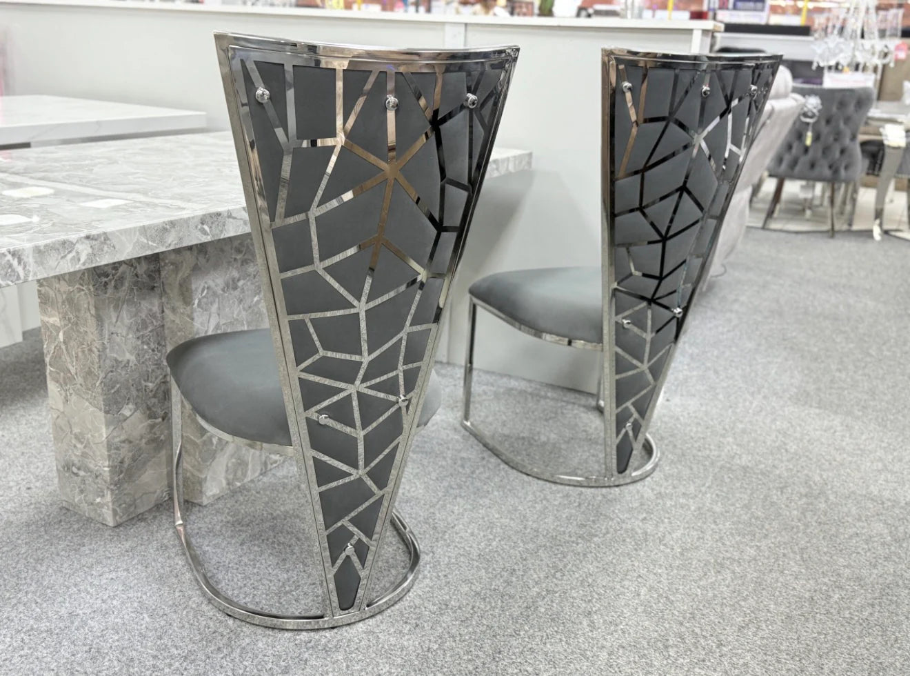 Pair of grey and silver Vienna dining chairs back side view modern upholstered dining chairs UK by Solid Furniture UK