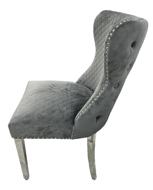 Grey velvet dining chair side view with chrome legs Solid Furniture UK
