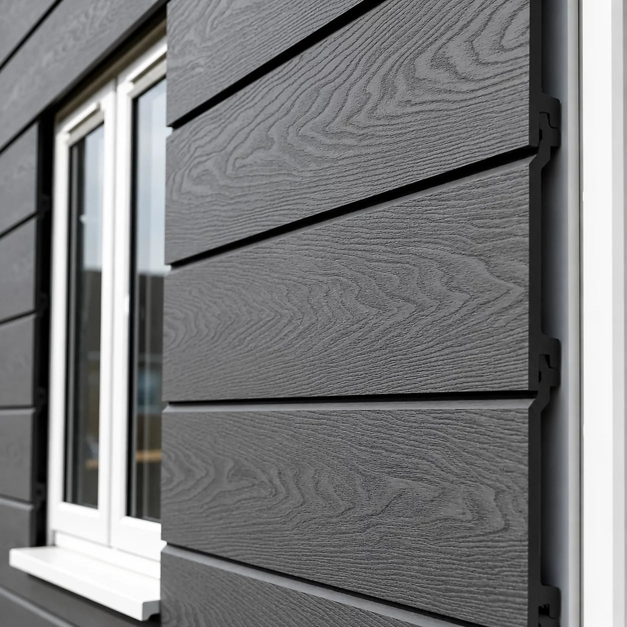 290cm grey waterproof outdoor exterior cladding panels installed on an outside wall by Solid Furniture UK