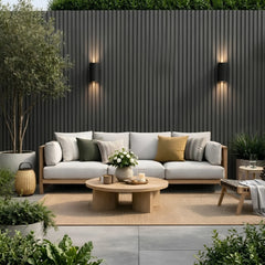 Grey seamless outdoor WPC wall panels 16×240cm pack of 12 installed in a garden by Solid Furniture UK