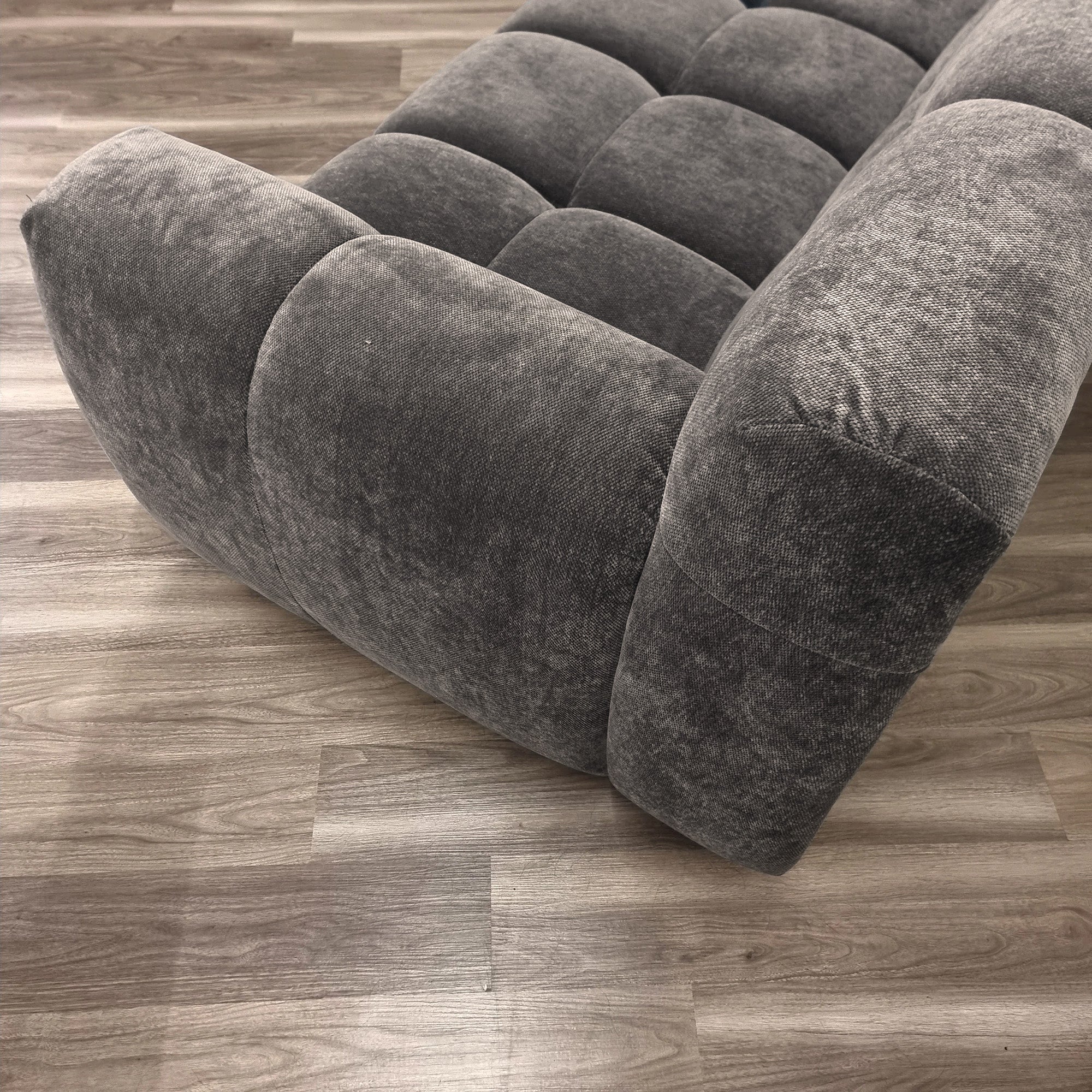 Harlem 3 seater sofa chocolate velvet angled view highlighting plush cushions and elegant curved silhouette, UK modern sofa solid furniture UK